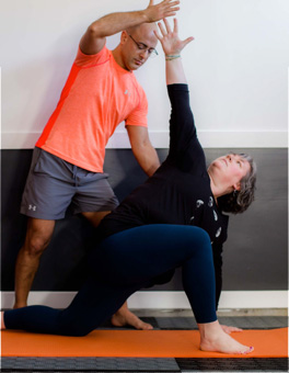 Adam-working-client-yoga-pose